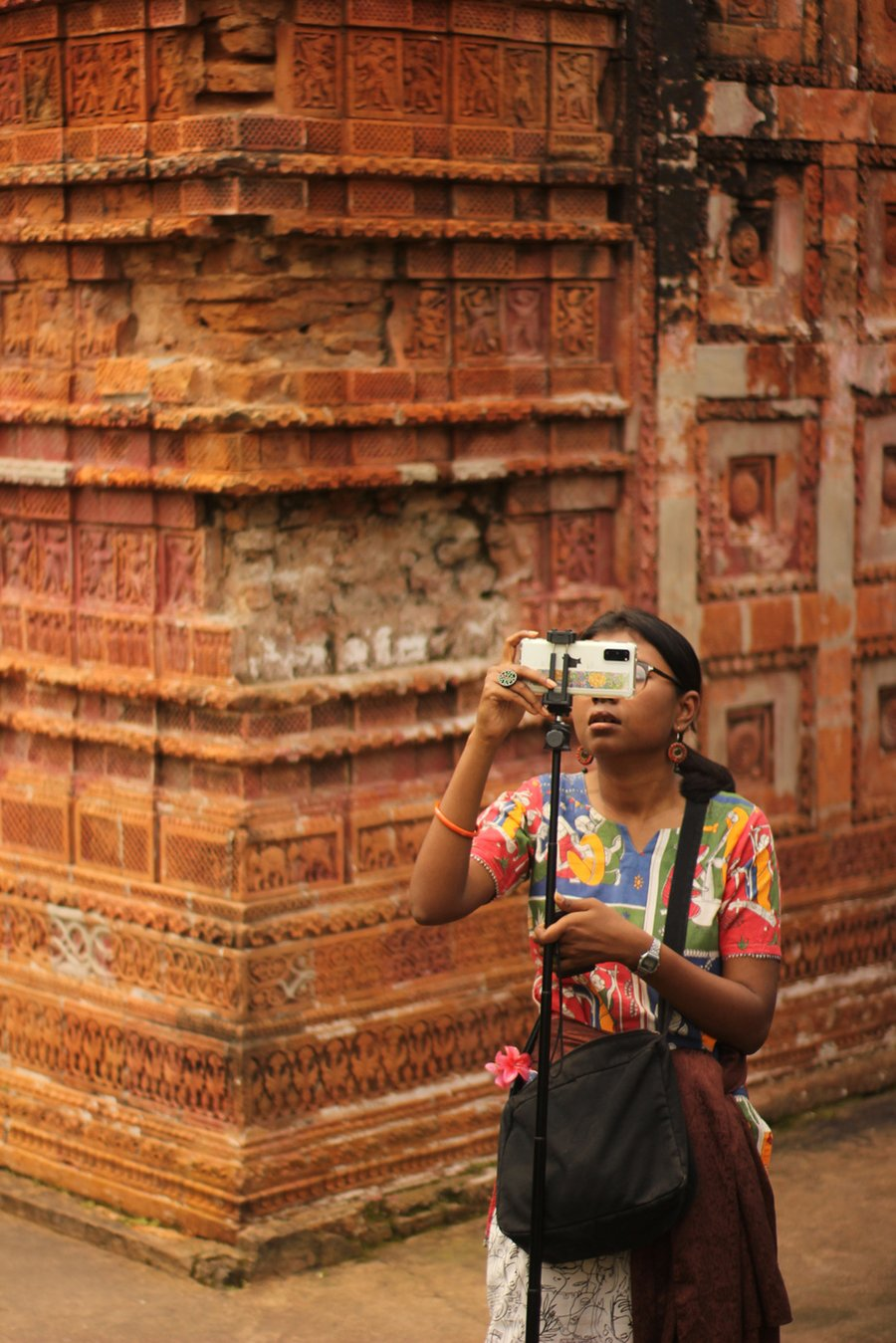 Samia Athay on location, filming at a heritage site